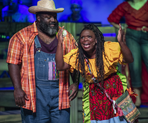 Robert Joseph, left, playing Tonton Julian, and Lauressa Pitz, as Mama Euralie.