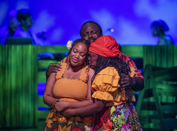 Carolyn O'Brien, left, playing Ti Moune, Robert Joseph, center, as Tonton Julian, and Lauressa Pitz, right, as Mama Euralie.