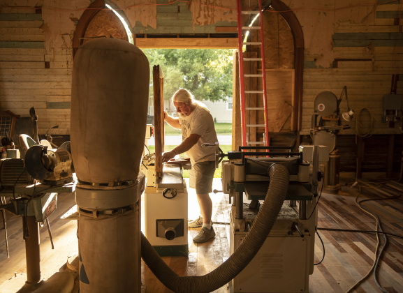 Robert Halstrom continues his work at what was once Granger United Methodist Church on Monday, May 22.  Halstrom and his wife Joanne bought the circa 1904 church in 2019.  The project had been put on hold for months, but slowly, Halstrom is back at work.   Photo by Andy Sharp.