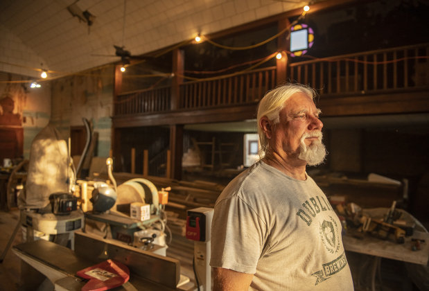 Robert Halstrom takes a moment to rest while continuing  his work at what was once Granger United Methodist Church on Monday, May 22.