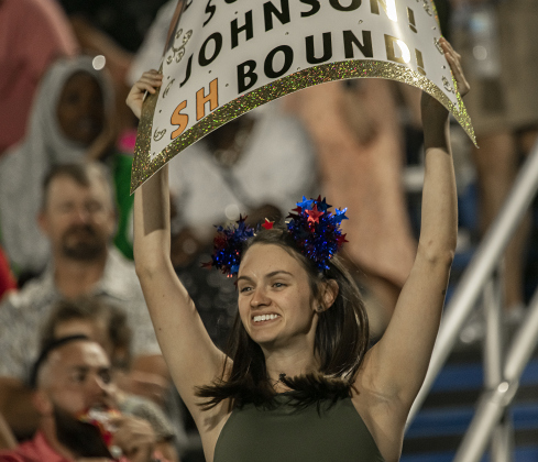 A family member cheers for East View graduating senior Sophia Johnson.