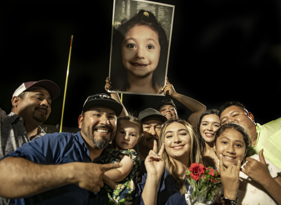 East View High School graduating senior Maria Guadalupe Salas Reyes (holding bouquet)  celebrates getting her diploma with family members at the conclusion of  the school's 2023 Commencement on Friday, May 26.