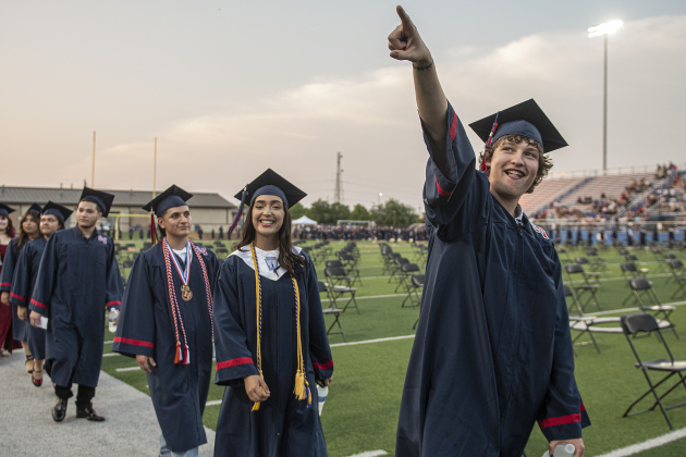 East View High School graduating seniors march onto Birkelbach Field for their 2023 Commencement on Friday, May 26.  A total of 457 students received their diplomas.