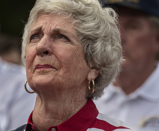 Betty Schleder shows emotion as "God Bless America" is sung near the conclusion of the Sun City Texas Community Association Memorial Day observance held Monday, May 29 at the Georgetown-Williamson County Veterans Memorial Plaza in Sun City.