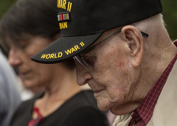 World War II Air Force veteran Ralph May, 96, bows his head for the closing benediction during  the Sun City Texas Community Association Memorial Day observance held Monday, May 29, 2023 at the Georgetown-Williamson County Veterans Memorial Plaza in Sun City.