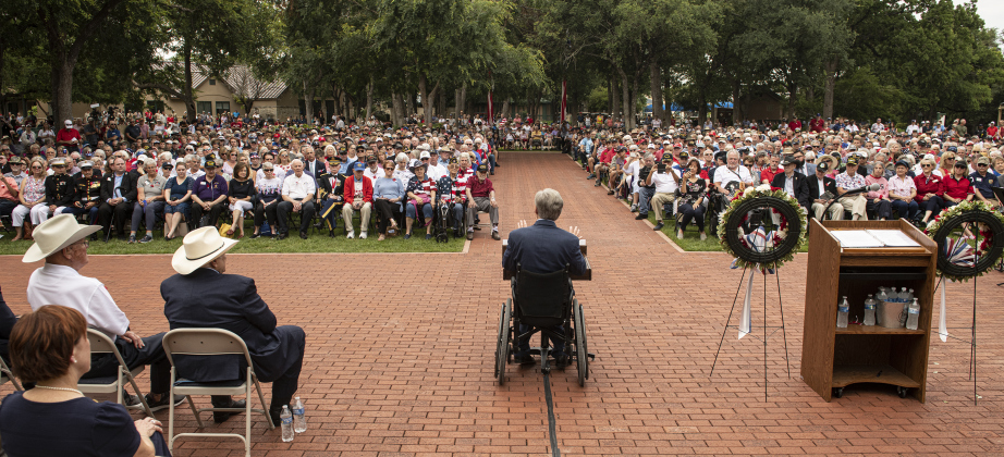 Texas Governor Greg Abbott speaks to a large crowd gathered at the Sun City Texas Community Association Memorial Day observance held Monday, May 29.