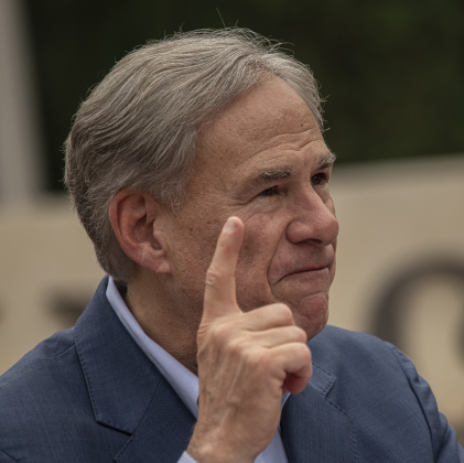 exas Governor Greg Abbott makes a point during his speech  at the Sun City Texas Community Association Memorial Day observance.