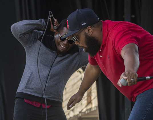 Members of Honey Made perform.