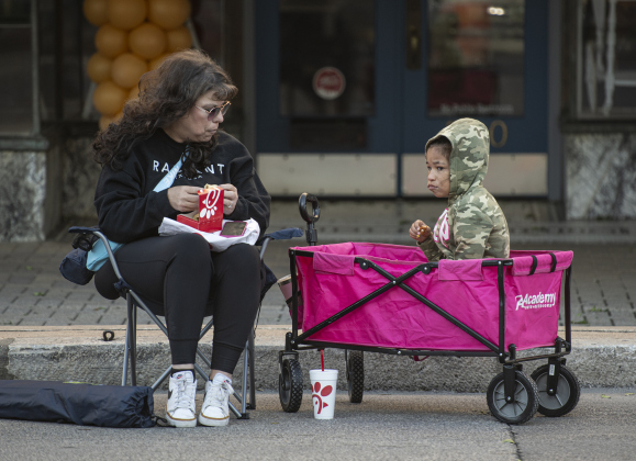 Kelly Floyd and her daughter Joslynn Byrd, 8, were among the first arrivals for the parade to come along Austin Avenue during the Red Poppy Festival on Saturday, April 29, 2023.  They were in place soon after 8 a.m. to secure good spot to view the parade, which began at 10 a.m.