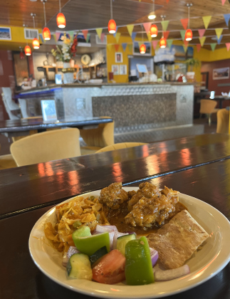 An order of Namaste’s Nepali style of Chicken Curry, Cabbage Masala, Kachumber salad and naan. 