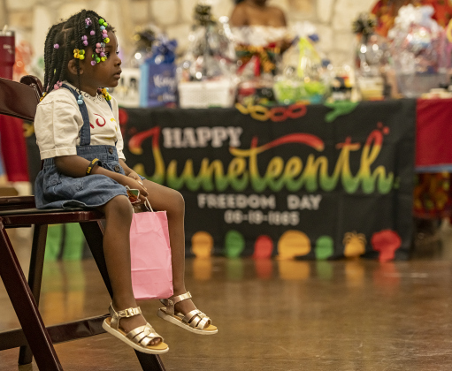  3-year-old attendee Shylah Soloye enjoyed watching Austin's Smooth & EZ Dance Company perform during Georgetown's 71st Juneteenth celebration.