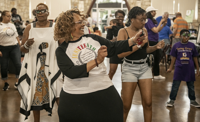 Regina Durden, front, President of the Georgetown Cultural Citizen Memorial Association, enjoyed dancing with attendees at  Georgetown's 71st Juneteenth celebration, held Saturday, June 17 at the Georgetown Community Center in San Gabriel Park.