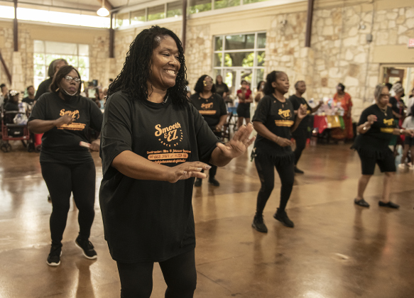 Sharon Hardaway, front, joins fellow members of the Austin-based Smooth &amp; EZ Dance Company during  Georgetown's 71st Juneteenth celebration.