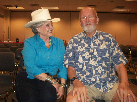 Peggy “Rowdy” Scarborough, from the Sun City duo of Rowdy &amp; Ron, talks with Bob Moore, who came to the May 19 Camille’s Memory Café with his wife, Vicki.