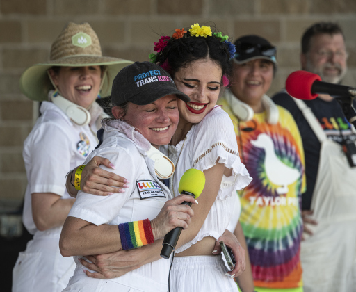 Taylor Pride founder Denise Rodgers, front left,  shares a hug with her daughter Emma Rodriguez, celebrating Emma's 21st birthday on the day of the 2023 Taylor Pride Festival, held Saturday, June 24, at Heritage Square Park in Taylor. Rodgers was onstage with Taylor Pride board members.