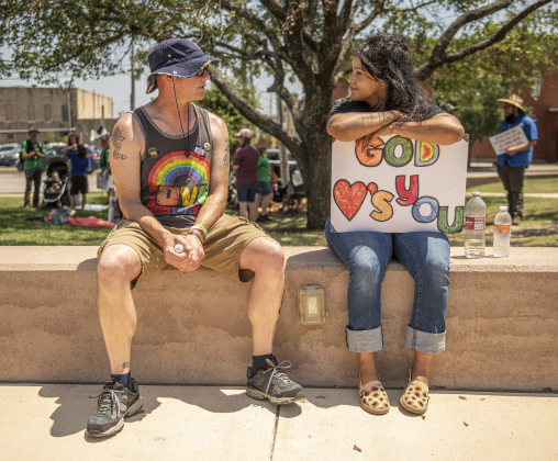 Matt Bushak, left, a member of Journey of Faith United Methodist Church in Round Rock, visits with Veneza Grillo, a member of Taylor's Christ Fellowship Church.