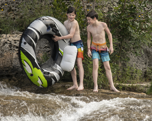 Jon Martinez, left, and  his twin brother Jake, right, enjoyed their time together  at Blue Hole Park.