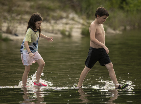 Olivea Wedding, left, soon to celebrate her 9th birthday, had fun with her uncle Christopher Wedding, 8, right, at Blue Hole Park on Saturday, June 3, 2023.
