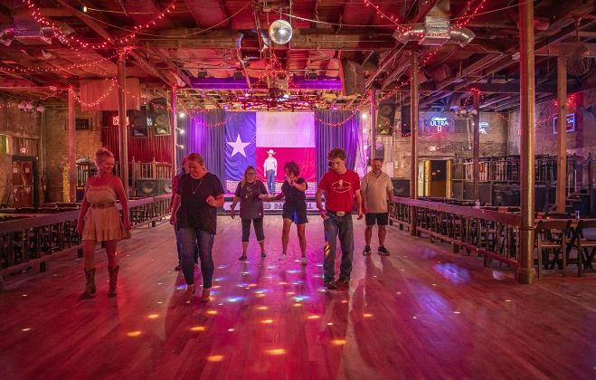 A  dance class is in full swing with a Line Dancing  session at Coupland Dancehall  on Sunday afternoon, June 4, 2023.