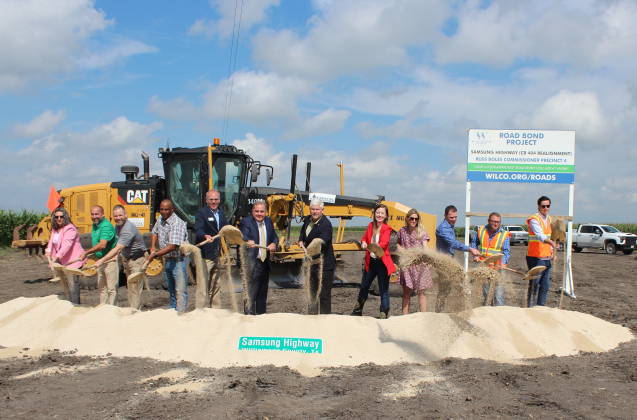 Standing, from left, are Rhonda Redden, justice of the peace Precinct 4; Robert Garcia, Taylor City Council; Brian LaBorde Taylor City Manager; Taylor Mayor Pro-Tem Gerald Anderson; Taylor Mayor Brandt Rydell; Wilco Precinct 4 Commissioner Russ Boles; Congressman Pete Session; Representative Caroline Harris; Dana Harris and Matt Menotti, with Samsung; and Levi Pickett and Andy Wynes, with Capital Excavation. Photo courtesy Williamson County