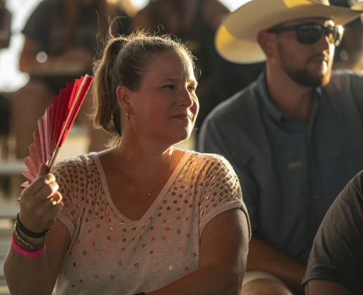 Rodeo attendee Tessa Streit was prepared for the heat with her old-fashioned fan.
