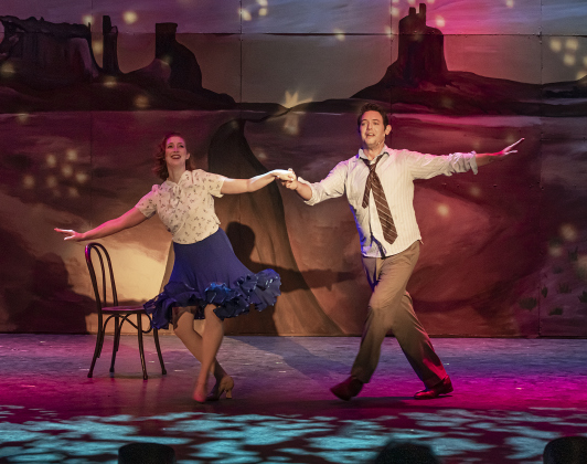 Elysia Worcester, left, playing Polly Baker, and Evan Scott, as Bobby Child,  are shown in a scene from the Thursday, June 29, 2023 dress rehearsal of "Crazy for You," playing on the Palace's Springer Stage through July 30.