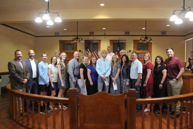 Williamson County Fair and Rodeo pose with the 2023 scholarship recipients and their families. The recipients are Ty Chase (center blue shirt), Paige Phalen (center blue dress) and Madeline Edwards (left in green and black shirt). Photo courtesy Williamson County Fair and Rodeo.