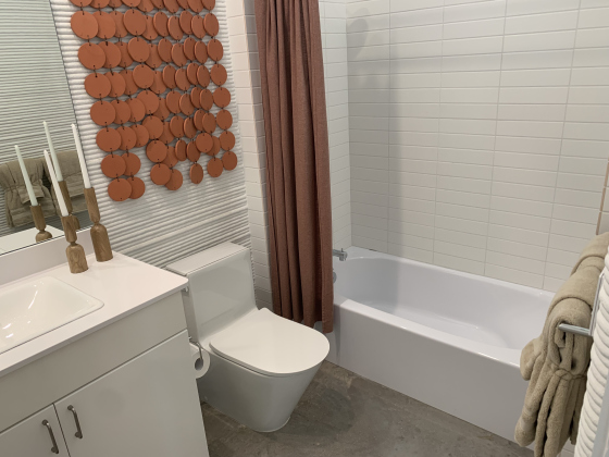One of the two bathrooms in the house has a bathtub as part of the shower.