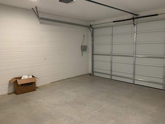 The two car garage is connected to the house.