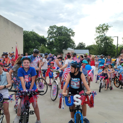 Families gather on their bikes ahead of the Old Town parade on July 4. Photo courtesy Amanda Parr