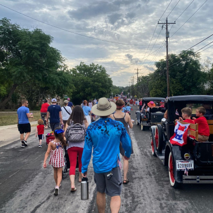 The second annual Old Town July 4 parade travels trough the neighborhood as residents walk to San José Park in Georgetown. Photo courtesy Amanda Parr