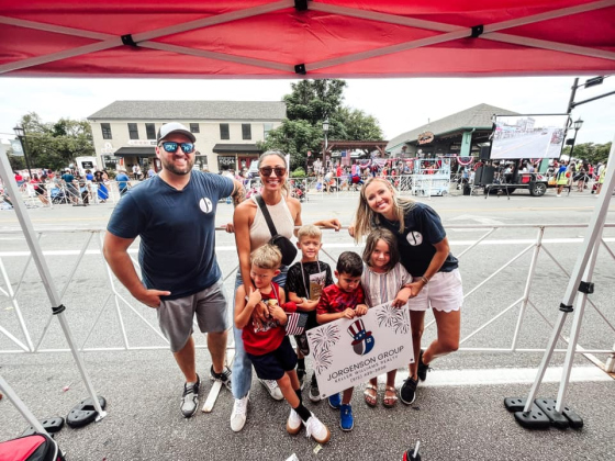 The Jorgenson Group with Keller Williams — Kasey Jorgenson, Amber Trom and Tanya Ker — get ready for the parade through downtown Round Rock July 4. Photo courtesy Amber Trom