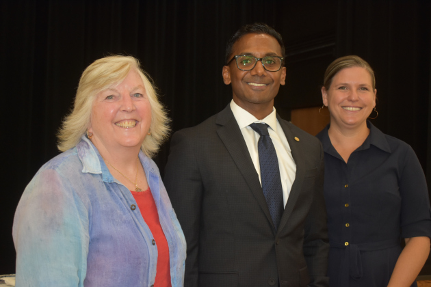 GISD trustees, president Elizabeth McFarland, right, and board secretary Stephanie Blanck, left, congratulate Devin Padavil following the board’s vote officially naming him the district’s next superintendent.