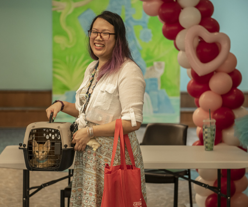 Linda Lam was elated after adopting 4-month-old Kolache, the last kitten adopted at the Georgetown Animal Shelter's kitten adoption event held at the Georgetown Public Library on Thursday, August 10. All 19 kittens brought to the library were adopted at a reduced adoption fee.   Photo by Andy Sharp.