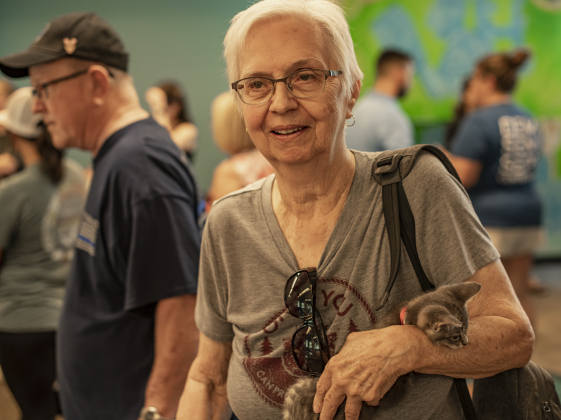 Marianna Ochs, front right, and her husband Ned Ochs, left, get ready to go home with the the kitten they adopted.