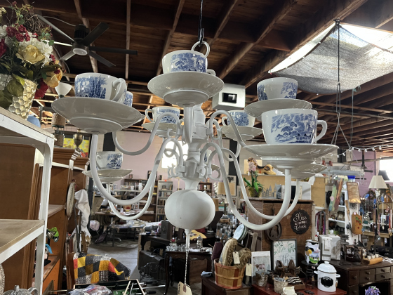 A teacup chandelier for sale at Florence Marketplace