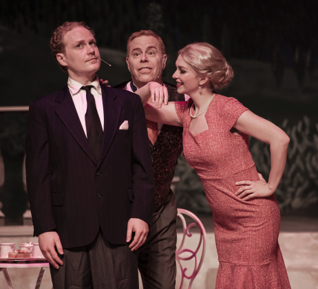 Creighton Moench, left, as Captain Georg Von Trapp, Lou Taylor-Castro, center, as Max Detweiller, and Olivia Christie, playing Elsa Schraeder,  are shown in a Thursday, August 17, 2023 scene from the Georgetown Palace production of "The Sound of Music," playing on the Springer Stage through September 17.  Photo by Andy Sharp.