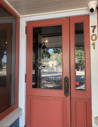 The door at 701 South Main Street reads "Coming Soon!". Photo by Kaitlyn Wilkes