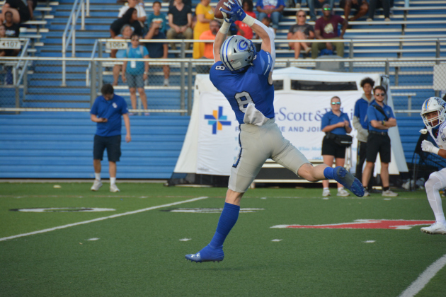 Senior Jacob Weishiemer catches the ball at the first home game of the season against Copperas Cove on Friday, August 25. Photo by Annabelle Bruesewitz, senior at Georgetown High School.
