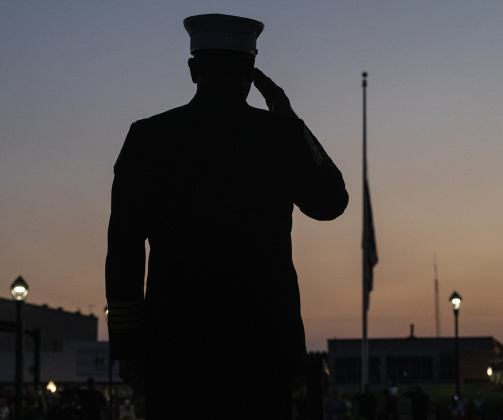 City of Taylor Assistan Fire Chief Bobby Copeland salutes the flag at half-staff near the conclusion of Taylor's 19th annual Patriot Day observance at Heritage Square September 11, 2021. Sun Archive. 