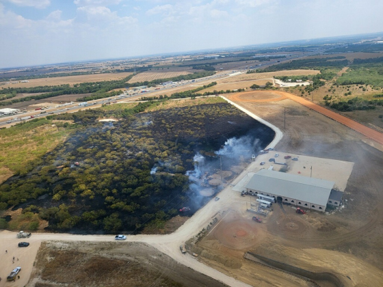 A grass fire named Rock Quarry consumes 21 acres of land near Jarrell on Friday, September 1. More than 20 organizations helped fight the fire. Photo courtesy of Williamson County.