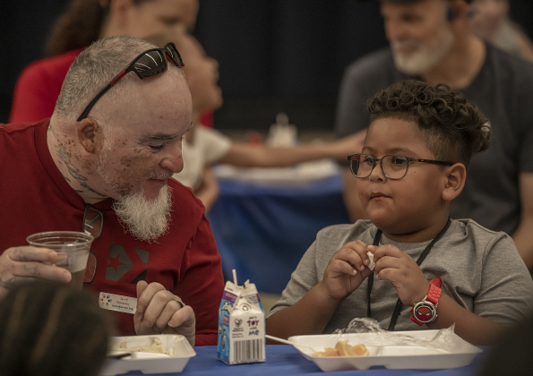 David Vallejo, left, spends time with his kindergartener grandson Delron Horde, 5, during a Grandparents' Day lunch held at Jarrell Elementary School on Friday, September 8, 2023.
