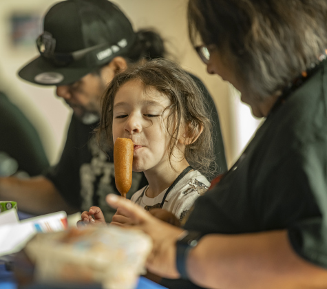 5-year-old kindergartener Braxton Bunch enjoys a meal with his grandparents, Ben and Lisa Nava during a Grandparents' Day lunch held at Jarrell Elementary School on Friday, September 8, 2023.