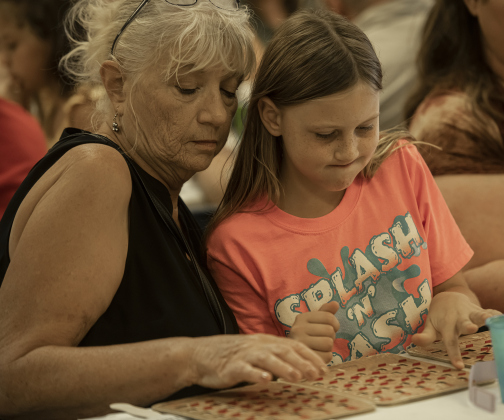 Mary Jo Tschoerner enjoys bingo with granddaughter Glenda Hill, 9.