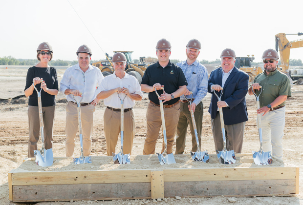 Mayor Jim Penniman-Morin of Cedar Park (middle) with representatives from  Cordova Real Estate Ventures, Riverside and Live Oak breaks ground on a 95-acre project called New Hope Corporate Park in Cedar Park August 31. Photo courtesy of Meredith Bender.