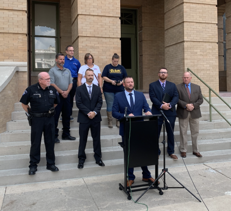 Charles Duval, third from left, the president of the Williamson County Deputies Association was joined by supporters as he spoke to the press on August 29. (Photo by Kaitlyn Wilkes)