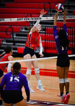 East View senior Ashlyn Walther elevates for a spike, during the Patriots' September 8 home victory over the Elgin Wildcats. (Photo by David Hernandez)
