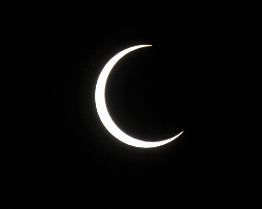 An annular eclipse is seen at 11:50 a.m. during a Saturday, October 14, 2023 gathering at Berry Springs Parks &amp; Preserve,  hosted by Friends of Berry Springs Park.  An annular eclipse occurs when the moon gets between the earth and sun.  The eclipse's visibility was approximately 89% in the Austin area.