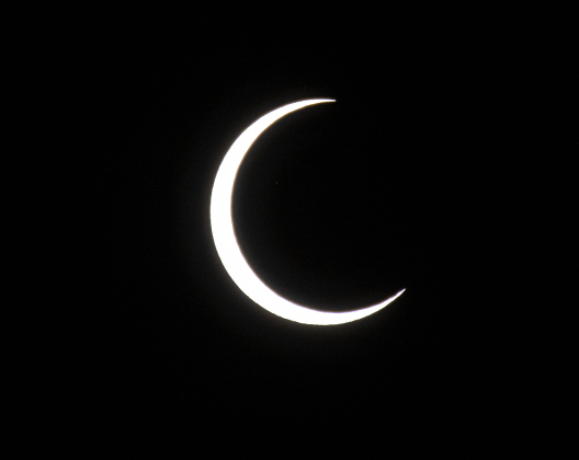 An annular eclipse is seen at 11:50 a.m. during a Saturday, October 14, 2023.