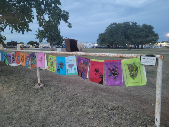 Artwork from Liberty Hill High School students create the entryway to the Sculpture Festival. Photo by Nalani Nuylan.